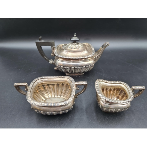 33 - A Victorian silver three piece Tea Service of semi-fluted boat shape, Birmingham 1900, 605gms all in