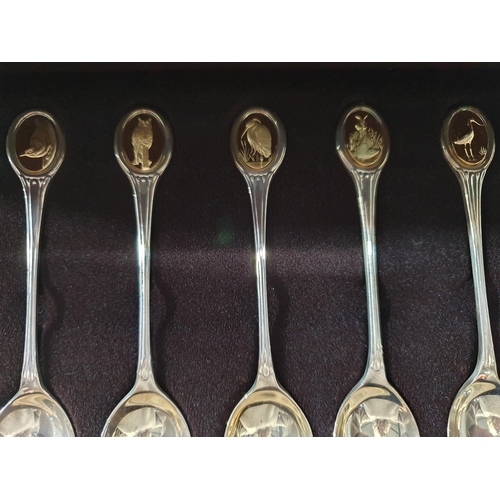 332 - An RSPB silver Bird Spoon Collection, twelve Spoons in fitted wooden case, along with documents