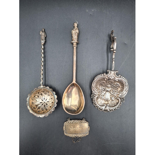 36 - An Edward VII silver Apostle Spoon, Birmingham 1918, two Sifting Spoons and a silver Port Label