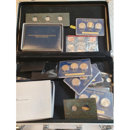 470 - A collection of modern US coinage to include Presidential Dollar Sets, various State Quarters, a few... 