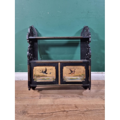 526 - An aesthetic movement Wall Cabinet, ebonised and fitted two doors, painted birds and butterflies in ... 