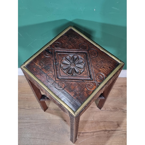 535 - An antique oak square Bedside Table with carved 17th century panel top, brass mounted on square legs... 