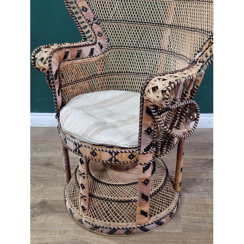 539 - A pair of vintage wicker Large Peacock Highback Armchairs. Similar to chairs used in Emmanuelle Film... 