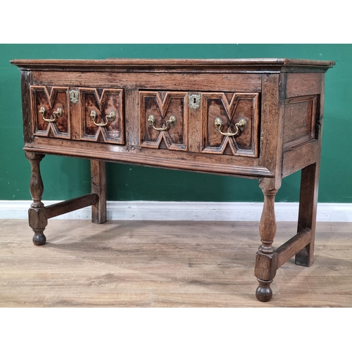 540 - An antique oak Dresser Base in the Jacobean style fitted two drawers with moulded fronts on baluster... 