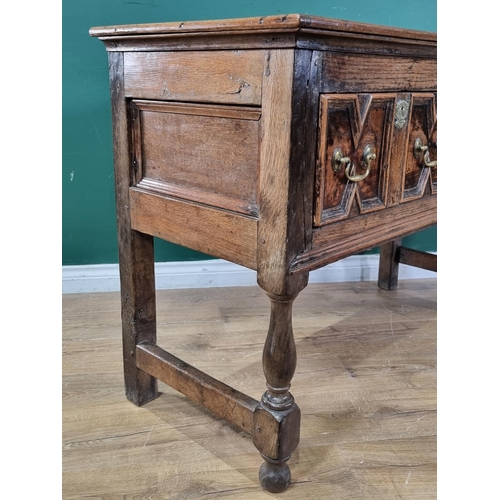 540 - An antique oak Dresser Base in the Jacobean style fitted two drawers with moulded fronts on baluster... 