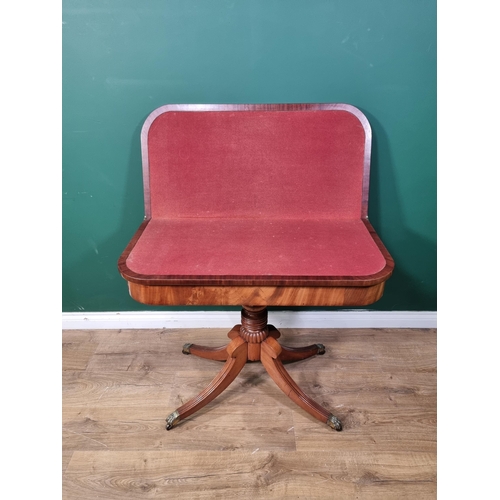 541 - A Regency mahogany card Table with D-shape fold-over top on turned and fluted column with quadruple ... 