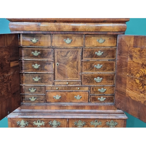 543 - An 18th Century walnut veneered Cabinet on chest base, the upper section fitted single long drawer a... 