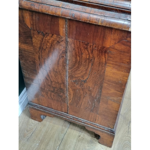 543 - An 18th Century walnut veneered Cabinet on chest base, the upper section fitted single long drawer a... 