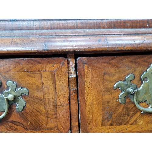 543 - An 18th Century walnut veneered Cabinet on chest base, the upper section fitted single long drawer a... 