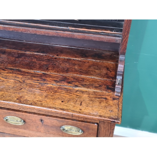 547 - An early 19th Century oak Dresser and Rack, the base fitted six drawers and two cupboard doors raise... 