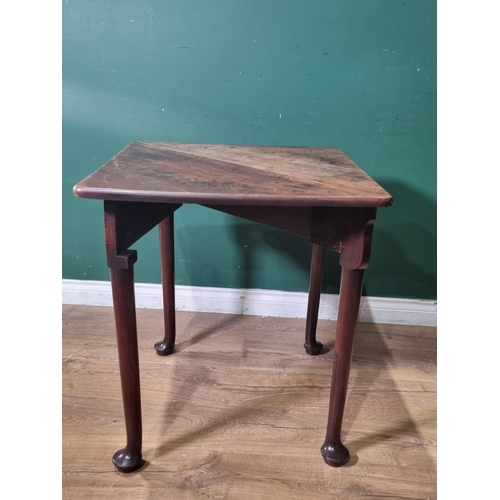 552 - A Georgian mahogany Table with single drop leaf, lifting to make a square table on turned supports a... 