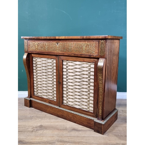 554 - A Regency brass inlaid rosewood Secretaire Cabinet with a fitted frieze drop front drawer above a pa... 