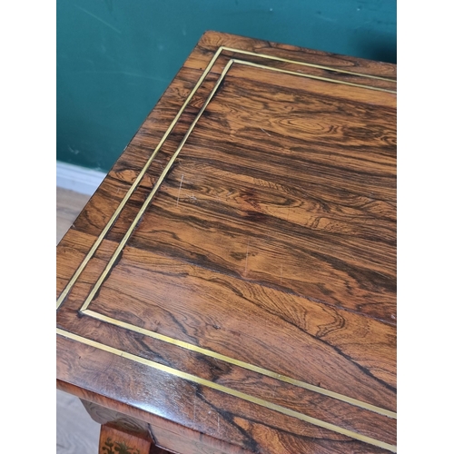 554 - A Regency brass inlaid rosewood Secretaire Cabinet with a fitted frieze drop front drawer above a pa... 