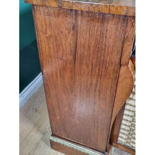 554 - A Regency brass inlaid rosewood Secretaire Cabinet with a fitted frieze drop front drawer above a pa... 