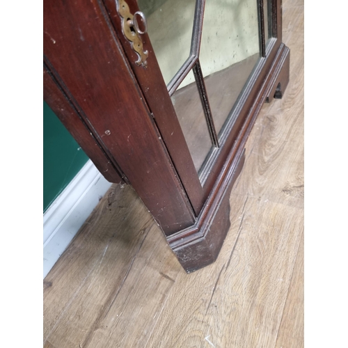 568 - A 19th century mahogany Corner Display cabinet with two astragal glazed doors on bracket feet