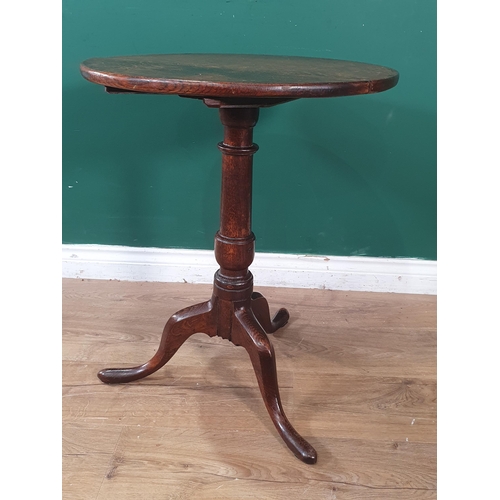 572 - A small antique oak Tilt Top Table with turned column and tripod base, 1ft 8in diam