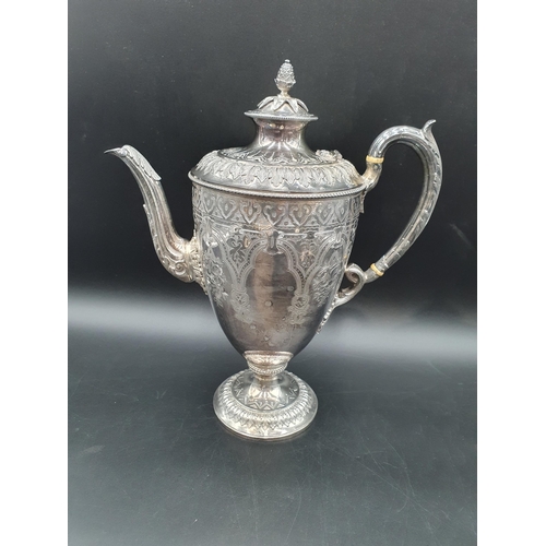 58 - A Victorian silver four piece Tea and Coffee Service of classical urn form, finely engraved flowers ... 