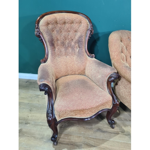 588 - A Victorian matched mahogany three piece Suite with button back upholstery, to include a double spoo... 