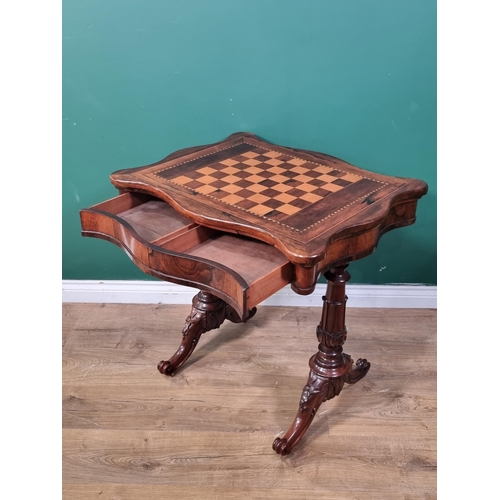 599 - A William IV rosewood Games Table having serpentine sides with inlaid chessboard top, chequered and ... 