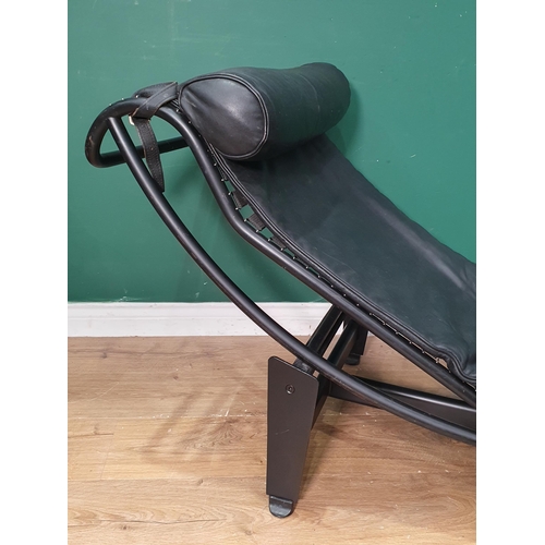 615 - A 1970's Le Corbusier designed black leather and tubular metal Lounger. Marked Cassina and logo, num... 