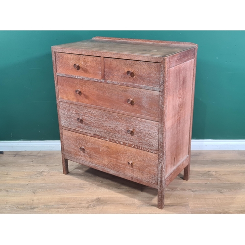 627 - A Heal's oak Chest of two short over three long graduated Drawers, with panelled sides and back, rai... 