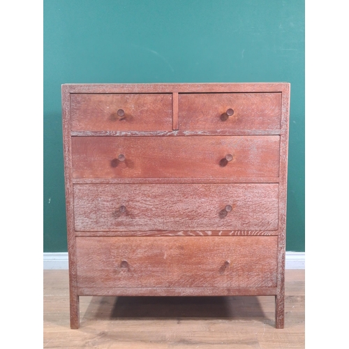 627 - A Heal's oak Chest of two short over three long graduated Drawers, with panelled sides and back, rai... 