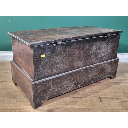 633 - An 18th Century oak Coffer Bach, the lift up lid with replacement hinges, above pair of fitted drawe... 