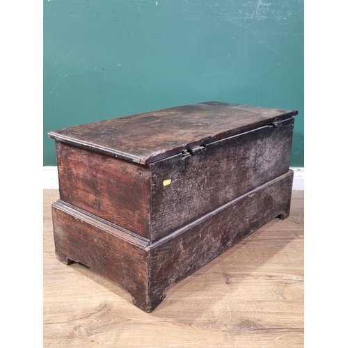 633 - An 18th Century oak Coffer Bach, the lift up lid with replacement hinges, above pair of fitted drawe... 