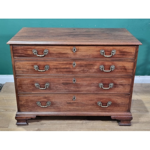 635 - A Georgian mahogany Chest of four long graduated drawers on ogee bracket feet, 3ft 6in W, 2ft 8