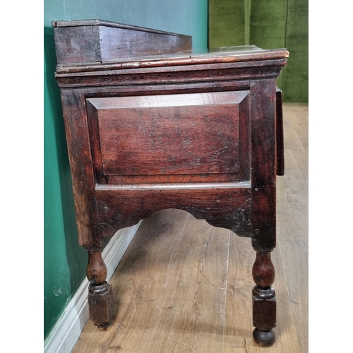 644 - An 18th Century oak Derbyshire Dresser Base with raised back, fitted three frieze drawers on baluste... 