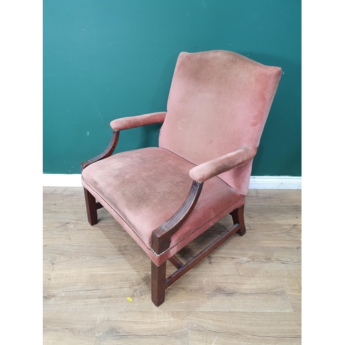 654 - A 19th Century mahogany framed Gainsborough Style Armchair in pink upholstery, with carved decoratio... 