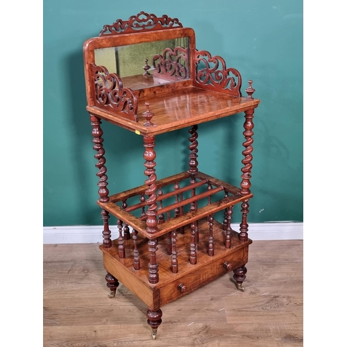 659 - A Victorian walnut Canterbury Whatnot with raised mirror back on spiral turned supports and fitted d... 