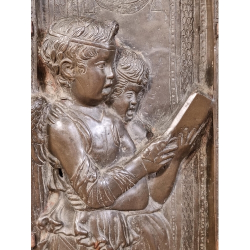 786 - A cast bronze relief Plaque/Panel, depicting standing winged Angels reading a Book, mounted in a mou... 