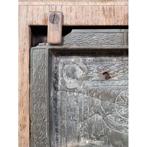 786 - A cast bronze relief Plaque/Panel, depicting standing winged Angels reading a Book, mounted in a mou... 