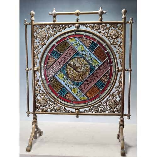 788 - A 19th Century Aesthetic movement brass and glass Fire Screen with foliage and floral pierced decora... 