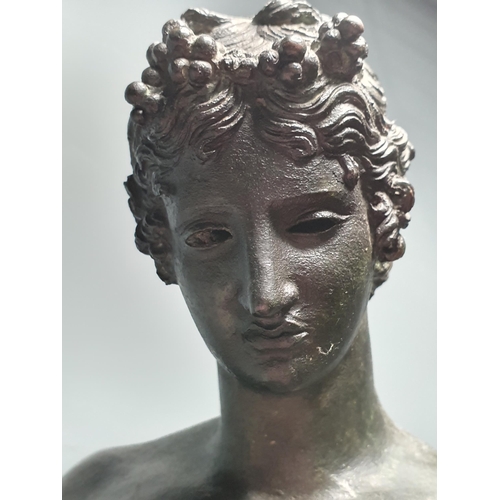 802 - A bronzed Figure of Narcissus stood on a circular base, 2ft 1in H