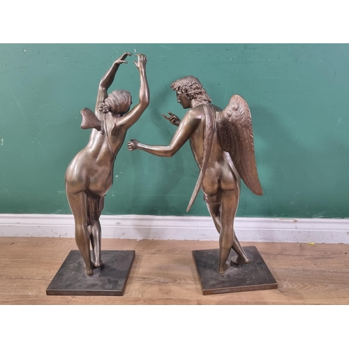 804 - A pair of bronze winged Figures on square bases, 29 and 26in H