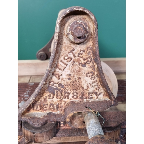 811 - A table top Butter Worker, possibly sycamore, with ironwork marked R.A. Lister, on wooden stand, 3ft... 