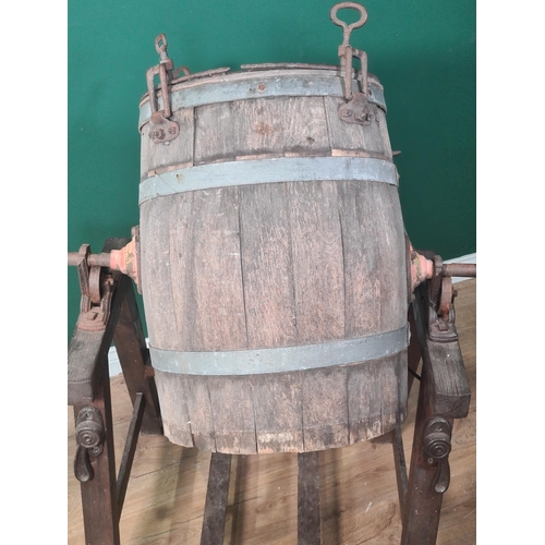 812 - A coopered wood Butter Churn with iron fittings on stand A/F, 3ft 8in