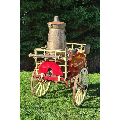 815 - A Victorian three wheeled Dairy Hand Cart with painted wooden sign inscribed 