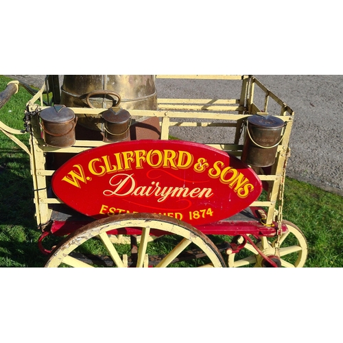 815 - A Victorian three wheeled Dairy Hand Cart with painted wooden sign inscribed 