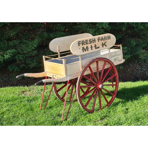 817 - An early 20th Century two wheeled Dairy Hand Cart with oval painted signs, inscribed 