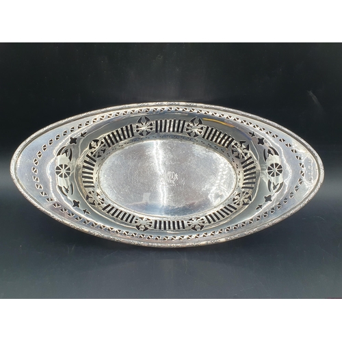 82 - A George V silver pierced oval Basket engraved initials, Birmingham 1934, 330gms