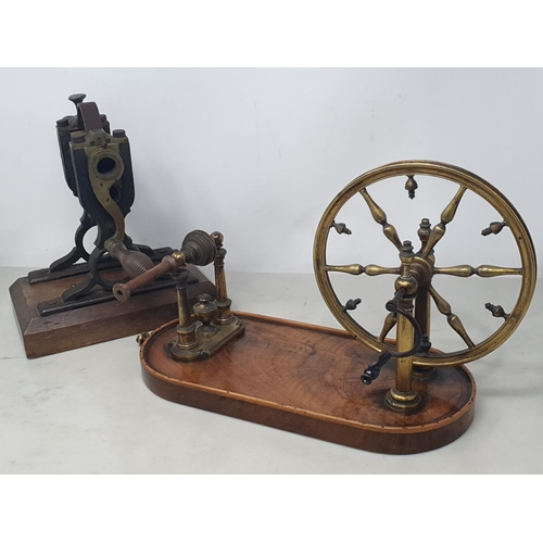 824 - A 19th Century mahogany Wool Winder with brass wheel and handle 9in H and an antique Crimper