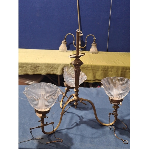 828 - Two brass Gas Chandeliers, one three branch, one two branch, with clear glass shades. converted from... 