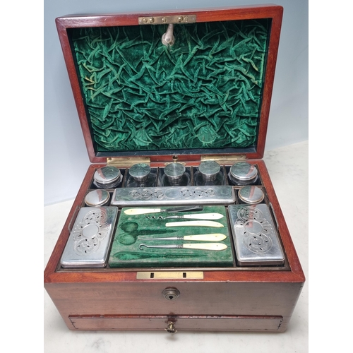 833 - A 19th Century Dressing Box containing silver and plated covered glass boxes and jars, fitted drawer... 