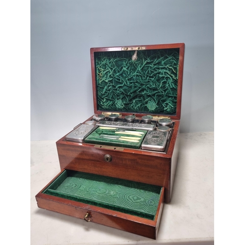 833 - A 19th Century Dressing Box containing silver and plated covered glass boxes and jars, fitted drawer... 