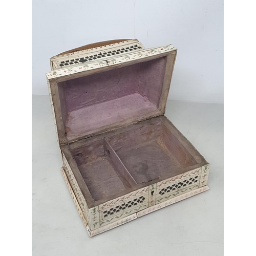 838 - A 19th Century bone Sewing Box made by a Prisoner of War, the hinged lid enclosing a fitted lined in... 