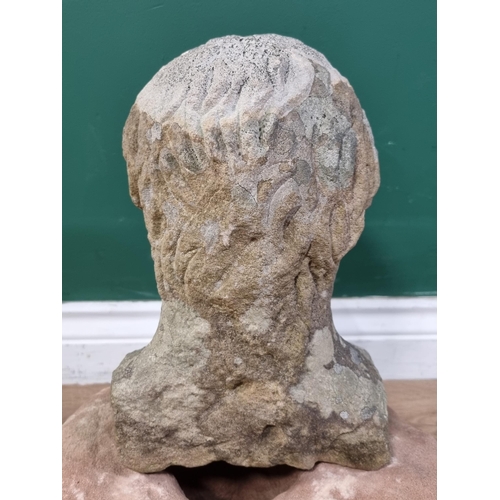 841 - A carved Limestone Bust of a Gentleman (Possibly Medieval) raised on associated Mill Stone base. 15