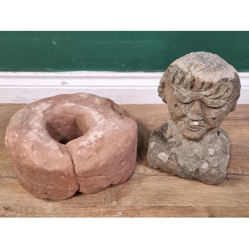 841 - A carved Limestone Bust of a Gentleman (Possibly Medieval) raised on associated Mill Stone base. 15